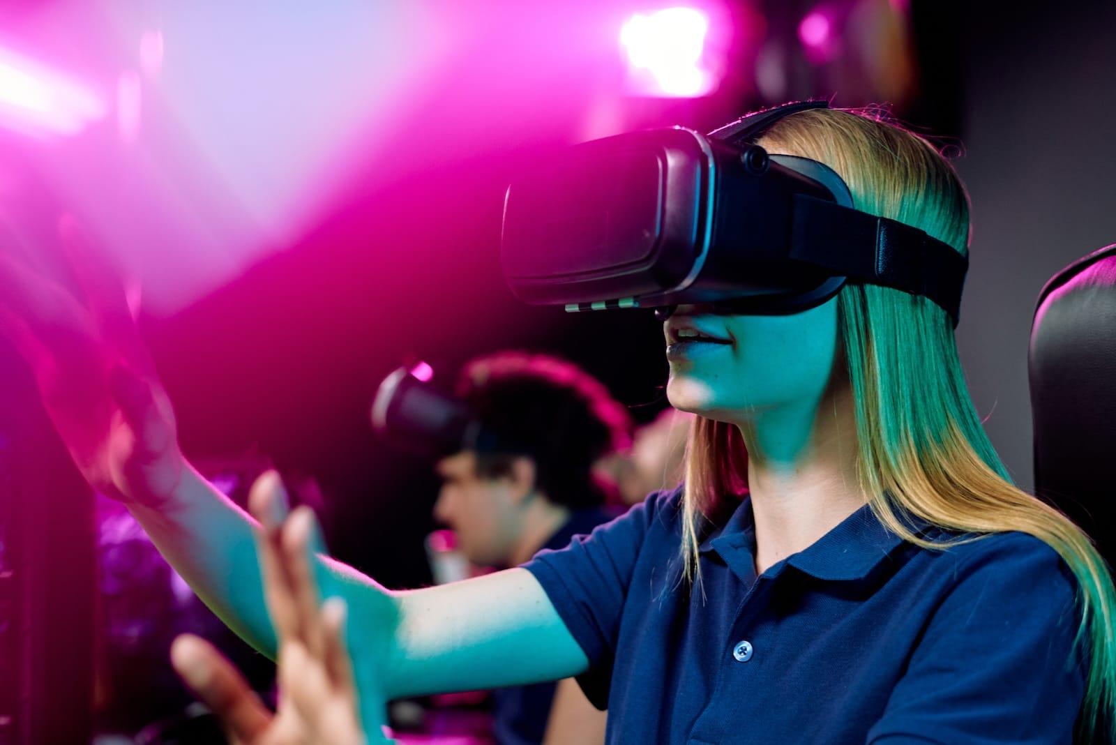 blond-girl-in-vr-goggle-touching-virtual-display-d-2023-11-27-05-25-15-utc
